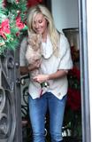 th_24632_Preppie_-_Ashley_Tisdale_picking_up_her_dog_from_her_parents_house_before_heading_to_the_Coffee_Bean_and_Tea_Leaf_in_Toluca_Lake_-_Dec._132_2009_265_122_46lo.jpg
